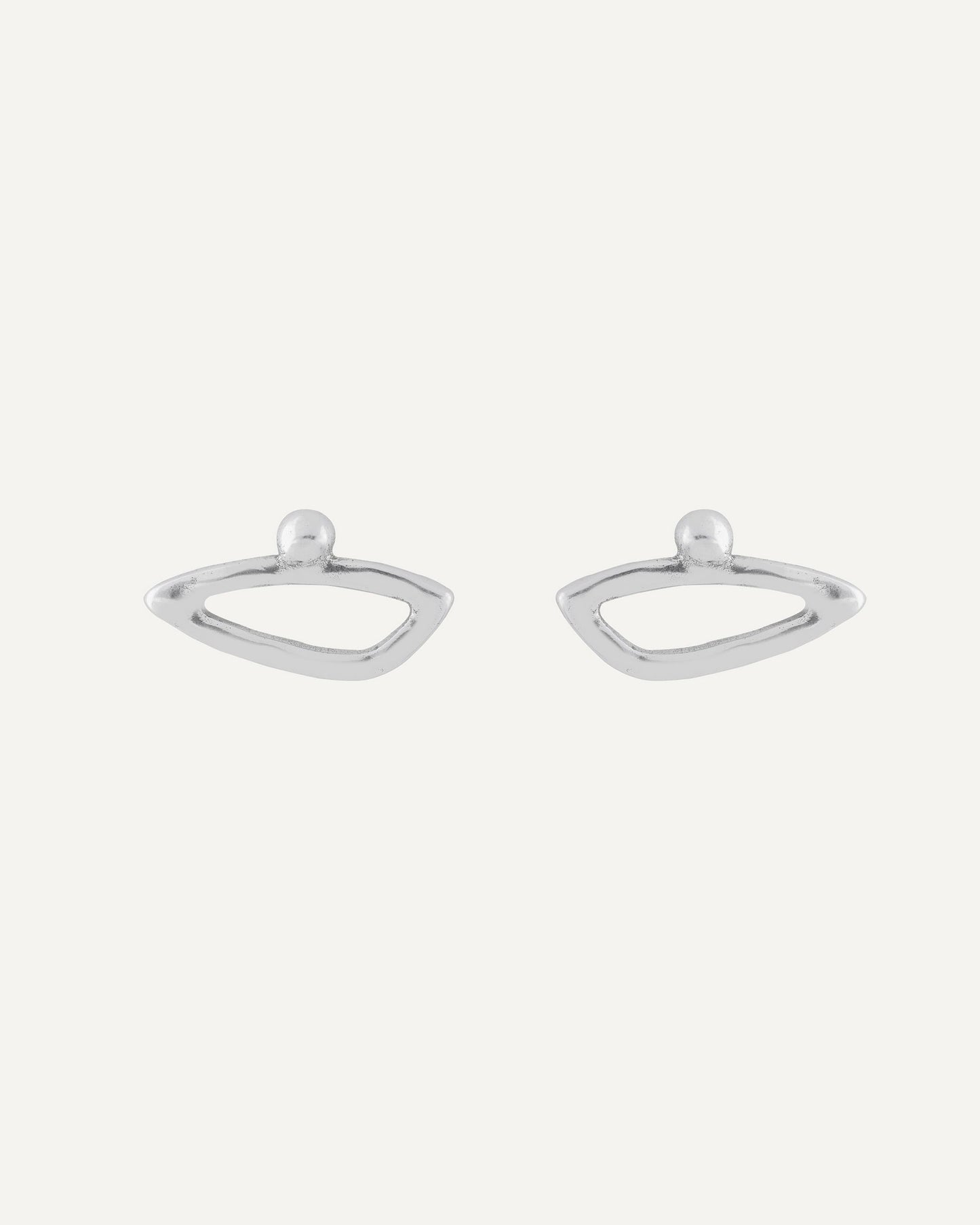 Geometric earrings with asymmetric organic shape in sterling silver finish. Vidda Jewelry product photo