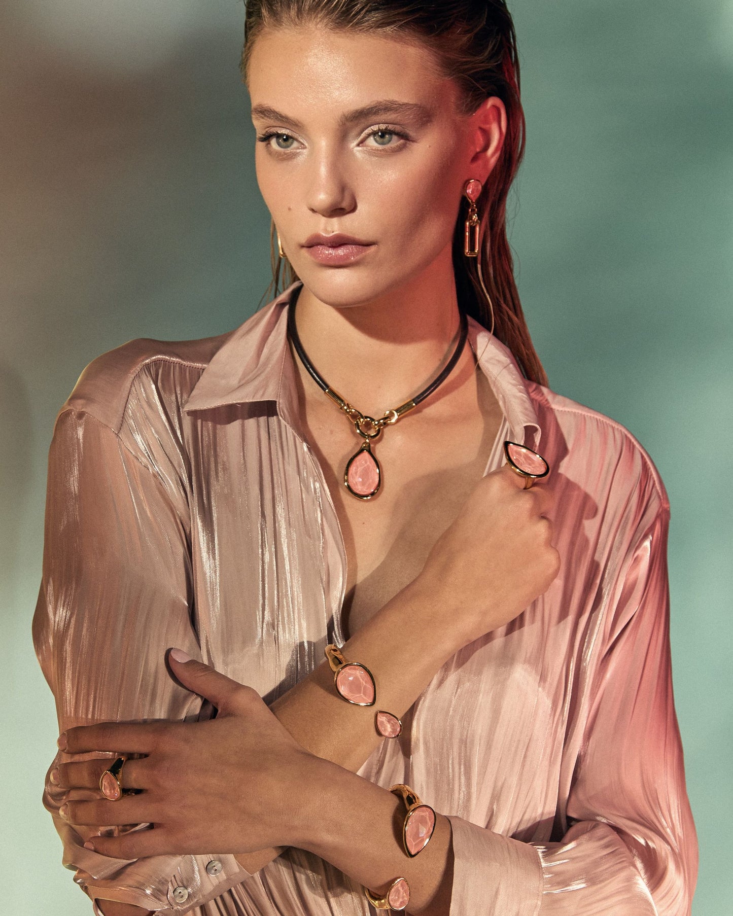 
                  
                    Leather necklace with Swarovski drop crystal styled with matching earrings, bracelet and ring

                  
                